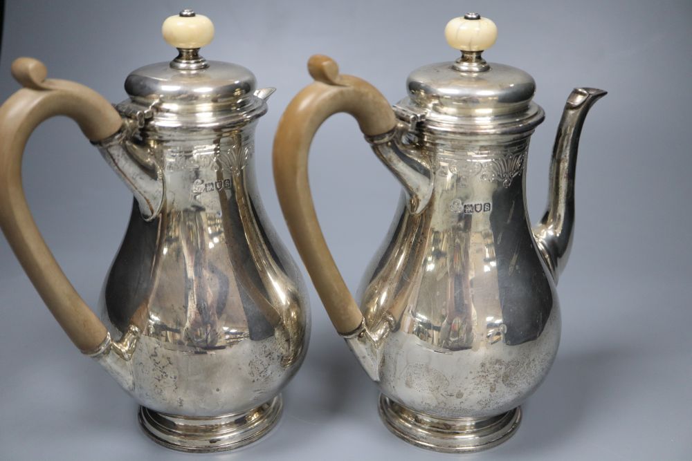 A George V silver cafe au lait pair by S.J. Phillips Ltd, London 1913, 20.5cm, gross 33oz.